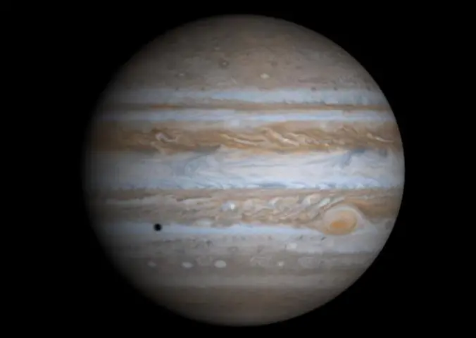 A circle with horizontal warm toned bands across it. 